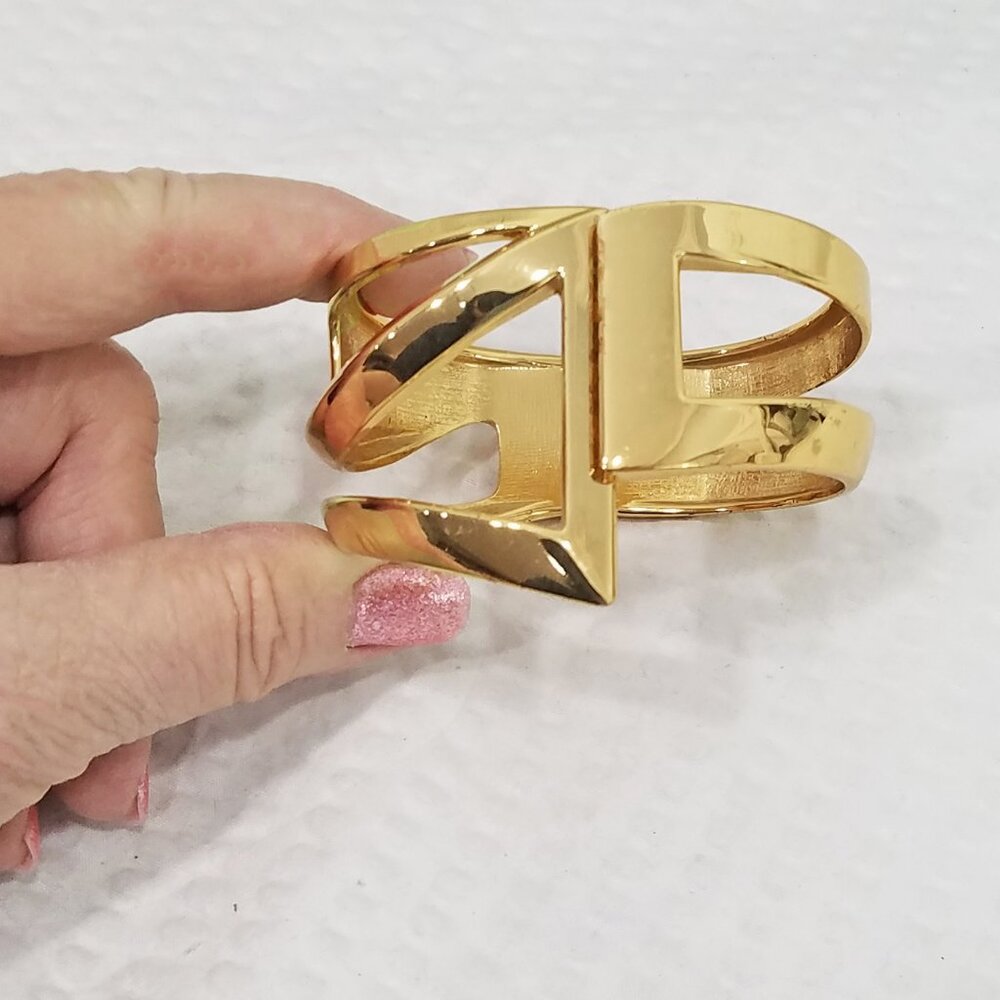 Vtg. Gold Tone Abstract Modern Double Band Hinged Oval Clamper Bypass Bracelet